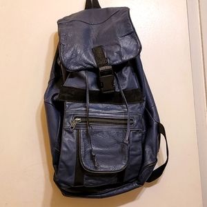 Vintage leather backpack blue ties and buckle hg9
